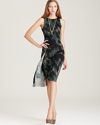 Exuding effortless sophistication, this Halston Heritage printed dress features intricate pleating and side ruching for a flattering silhouette. Exuding effortless sophistication, this Halston Heritage printed dress features intricate pleating and side ruching for a flattering silhouette.