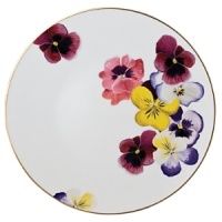 Pensees dinner plate by Bernardaud. This lively, luxurious plate is sure to transform your table into a celebration of spring. The floral watercolor pattern features delicate, multicolored pansies that appear to be strewn across the surface of each piece. Pensees dinner plate by Bernardaud. This lively, luxurious plate is sure to transform your table into a celebration of spring. The floral watercolor pattern features delicate, multicolored pansies that appear to be strewn across the surface of each piece.