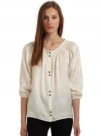 THE LOOKSubtle floral printSmocked detail at neckThree-quarter length sleeves with elastic cuffs Button-frontTHE FITAbout 25 from shoulder to hemTHE MATERIALSilkCARE & ORIGINDry cleanImportedModel shown is 5'10 (177cm) wearing US size Small. THE LOOKSubtle floral printSmocked detail at neckThree-quarter length sleeves with elastic cuffs Button-frontTHE FITAbout 25 from shoulder to hemTHE MATERIALSilkCARE & ORIGINDry cleanImportedModel shown is 5'10 (177cm) wearing US size Small.