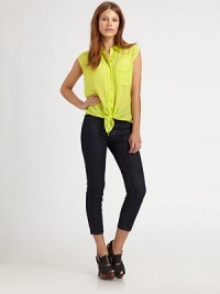 Your favorite silk button-down, cropped and sleeveless with a chic tie-front hem.Point collarExtended shouldersButton-down placketChest pocketAbout 25 from shoulder to hemSilkDry cleanImportedModel shown is 5'8½ (174cm) wearing US size Small. Your favorite silk button-down, cropped and sleeveless with a chic tie-front hem.Point collarExtended shouldersButton-down placketChest pocketAbout 25 from shoulder to hemSilkDry cleanImportedModel shown is 5'8½ (174cm) wearing US size Small.