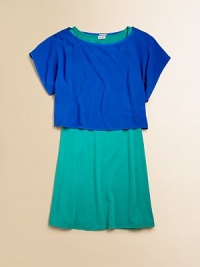 A simple colorblocking design is accented in this layered-look frock.ScoopneckShort sleevesPullover style50% cotton/50% modalMachine washImported A simple colorblocking design is accented in this layered-look frock.ScoopneckShort sleevesPullover style50% cotton/50% modalMachine washImported
