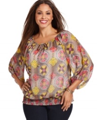 Capture a vivid bohemian spirit with Alfani's three-quarter-sleeve plus size peasant top, cinched by a smocked hem. Capture a vivid bohemian spirit with Alfani's three-quarter-sleeve plus size peasant top, cinched by a smocked hem.