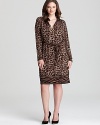 In a lively medley of animal prints, this MICHAEL Michael Kors Plus dress enlivens your 9-to-5 style. Finish the look with polished pumps and get in step with the fashion pack.