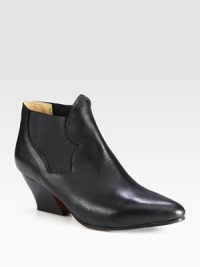 On-trend silhouette hitting just above the ankle, impeccably crafted of soft Italian leather with comfortable elastic gores. Stacked heel, 2½ (65mm)Leather upperPull-on style with elastic goresLeather lining and solePadded insoleMade in ItalyThis style runs small. We recommend ordering one half size up for a standard fit. On-trend silhouette hitting just above the ankle, impeccably crafted of soft Italian leather with comfortable elastic gores. Stacked heel, 2½ (65mm)Leather upperPull-on style with elastic goresLeather lining and solePadded insoleMade in ItalyThis style runs small. We recommend ordering one half size up for a standard fit.