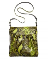 An intriguing snakeskin print covers this versatile crossbody for a sassy style you will adore. This FALCHI by Falchi bag will bring new life to your look. An intriguing snakeskin print covers this versatile crossbody for a sassy style you will adore. This FALCHI by Falchi bag will bring new life to your look.
