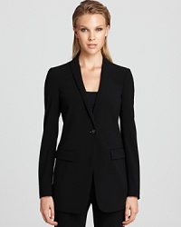 In stretch crepe, this chic Armani Collezioni blazer is a staple piece every working woman needs in her office wardrobe. In stretch crepe, this chic Armani Collezioni blazer is a staple piece every working woman needs in her office wardrobe.