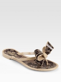 Lace print adorns this rubber slip-on for vintage appeal.Slip-on style Rubber straps and sole Made in ItalyOUR FIT MODEL RECOMMENDS ordering one half size down as this style runs large. Lace print adorns this rubber slip-on for vintage appeal.Slip-on style Rubber straps and sole Made in ItalyOUR FIT MODEL RECOMMENDS ordering one half size down as this style runs large.
