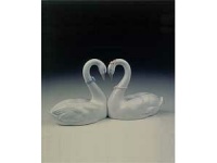 Exquisitely crafted of porcelain, the Endless Love figurine by Lladro presents a pair of snowy swans united in love. Designed as a wedding cake topper, or a bridal or anniversary gift, this heirloom quality collectible will be cherished for generations to come. Exquisitely crafted of porcelain, the Endless Love figurine by Lladro presents a pair of snowy swans united in love. Designed as a wedding cake topper, or a bridal or anniversary gift, this heirloom quality collectible will be cherished for generations to come.