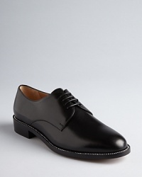 Salvatore Ferragamo takes these luxurious oxfords over the top with incredible detail: Swarovski crystals shine along the edge of each sole. Salvatore Ferragamo takes these luxurious oxfords over the top with incredible detail: Swarovski crystals shine along the edge of each sole.
