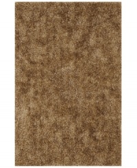 Add rich, shimmering texture to any modern room with the Metallic taupe area rug from Dalyn. Hand-tufted of soft polyester, this high-luster shag area rug puts comfort and fun back in floor decor. Add rich, shimmering texture to any modern room with the Metallic taupe area rug from Dalyn. Hand-tufted of soft polyester, this high-luster shag area rug puts comfort and fun back in floor decor.