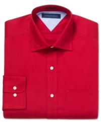 Put some pop in your daily desk look with this solid dress shirt from Tommy Hilfiger. Put some pop in your daily desk look with this solid dress shirt from Tommy Hilfiger.
