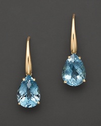 An elegant blue topaz drop earring in 18 Kt. yellow gold. With Roberto Coin's signature ruby accents. An elegant blue topaz drop earring in 18 Kt. yellow gold. With Roberto Coin's signature ruby accents.