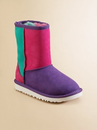 A colorblock, patchwork design that will make any outfit pop with color. Slip-on Sheepskin upper EVA sole Padded insole Sheepskin lining Imported A colorblock, patchwork design that will make any outfit pop with color. Slip-on Sheepskin upper EVA sole Padded insole Sheepskin lining Imported