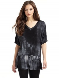 THE LOOKTie-dyedV-neck Short dolman sleevesDrawstring dropped waistVented side hemTHE FITAbout 30 from shoulder to hemTHE MATERIAL95% polyester/5% spandexCARE & ORIGINHand washMade in USA of imported fabricModel shown is 5'9½ (176cm) wearing US size Small. THE LOOKTie-dyedV-neck Short dolman sleevesDrawstring dropped waistVented side hemTHE FITAbout 30 from shoulder to hemTHE MATERIAL95% polyester/5% spandexCARE & ORIGINHand washMade in USA of imported fabricModel shown is 5'9½ (176cm) wearing US size Small.