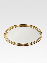 A beautiful serving platter in fine Limoges porcelain, made entirely by hand and finished with individually-applied 14k gold along the pearl border. From the Perlee Gold Collection Porcelain 14 X 7 Dishwasher safe Imported A beautiful serving platter in fine Limoges porcelain, made entirely by hand and finished with individually-applied 14k gold along the pearl border. From the Perlee Gold Collection Porcelain 14 X 7 Dishwasher safe Imported