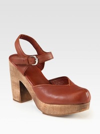 An instant leather staple with an elevated wooden platform and adjustable ankle strap. Wooden heel, 4 (100mm)Wooden platform, 1 (25mm)Compares to a 3 heel (75mm)Leather upperAdjustable ankle strapLeather liningRubber solePadded insoleImportedOUR FIT MODEL RECOMMENDS ordering true size. An instant leather staple with an elevated wooden platform and adjustable ankle strap. Wooden heel, 4 (100mm)Wooden platform, 1 (25mm)Compares to a 3 heel (75mm)Leather upperAdjustable ankle strapLeather liningRubber solePadded insoleImportedOUR FIT MODEL RECOMMENDS ordering true size.