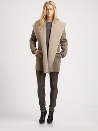 Rich wool crepe, slightly oversized in a shapely open-front silhouette.HoodWide foldover lapelsOpen frontAbout 33 from shoulder to hem90% wool/10% nylonDry cleanImportedModel shown is 5'11 (180cm) wearing US size Small. Rich wool crepe, slightly oversized in a shapely open-front silhouette.HoodWide foldover lapelsOpen frontAbout 33 from shoulder to hem90% wool/10% nylonDry cleanImportedModel shown is 5'11 (180cm) wearing US size Small.
