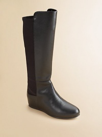 She'll be styling like a cowgirl in these faux leather, ultra-versatile, ultra-tall boots.Pull-on styleFaux leather and neoprene upperFaux leather liningRubber solePadded insoleImported She'll be styling like a cowgirl in these faux leather, ultra-versatile, ultra-tall boots.Pull-on styleFaux leather and neoprene upperFaux leather liningRubber solePadded insoleImported