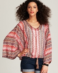 Hippie-chic and boasting huge personality, this Sanctuary poncho pumps up your look for a season of music festivals and major style moments. Hippie-chic and boasting huge personality, this Sanctuary poncho pumps up your look for a season of music festivals and major style moments.