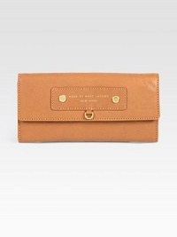 A classic flap-front silhouette of ultra-smooth leather with a center signature logo stamp. Flap-snap closureOne inner zip compartmentOne inside open pocketTwelve credit card slotsFully lined7¾W X 4H X 1DImported A classic flap-front silhouette of ultra-smooth leather with a center signature logo stamp. Flap-snap closureOne inner zip compartmentOne inside open pocketTwelve credit card slotsFully lined7¾W X 4H X 1DImported