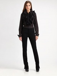 Part equestrian ease, part tuxedo elegance, this slim pant can be as sporty or as dressy as you need it to be, styled in rich stretch wool crepe with a flattering slim fit.Bandless waistFly frontInside adjustable button waist tabsCenter back notchBack buckle detailBack welt pocketsSilk side tuxedo stripesSide split hemRegular riseInseam Part equestrian ease, part tuxedo elegance, this slim pant can be as sporty or as dressy as you need it to be, styled in rich stretch wool crepe with a flattering slim fit.Bandless waistFly frontInside adjustable button waist tabsCenter back notchBack buckle detailBack welt pocketsSilk side tuxedo stripesSide split hemRegular riseInseam