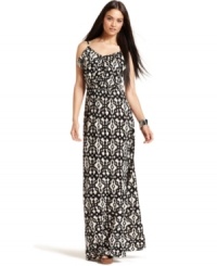 Get on trend with this tribal-printed maxi dress from INC--a ruffled tier at the neckline and a flattering silhouette make it a must-have! Get on trend with this tribal-printed maxi dress from INC--a ruffled tier at the neckline and a flattering silhouette make it a must-have!