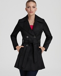 Pleating lends movement and feminine flair to this double-breasted trench from Via Spiga. Pleating lends movement and feminine flair to this double-breasted trench from Via Spiga.