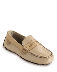 A classic driving shoe remixed with contrast construction and penny loafer detail. A classic driving shoe remixed with contrast construction and penny loafer detail.
