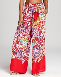 Say aloha to comfortable beachwear with these Nanette Lepore coverup pants. The Hula Gal print and relaxed fit is well-suited for a tropical paradise. Say aloha to comfortable beachwear with these Nanette Lepore coverup pants. The Hula Gal print and relaxed fit is well-suited for a tropical paradise.