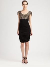 Lavish beading and soft ruching make this body-conscious design a quintessential look for evening cocktails.Scoop necklineShort sleevesBeaded bodiceEmpire waistRuched, front and backConcealed back zipperAbout 38 from shoulder to hemPolyesterSpot cleanImportedModel shown is 5'10 (177cm) wearing US size 4. Lavish beading and soft ruching make this body-conscious design a quintessential look for evening cocktails.Scoop necklineShort sleevesBeaded bodiceEmpire waistRuched, front and backConcealed back zipperAbout 38 from shoulder to hemPolyesterSpot cleanImportedModel shown is 5'10 (177cm) wearing US size 4.