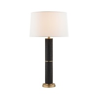 The black faux crocodile post atop a warm brass base on this Ralph Lauren table lamp casts an elegant light in any room. The black faux crocodile post atop a warm brass base on this Ralph Lauren table lamp casts an elegant light in any room.