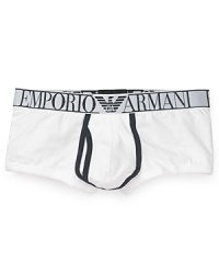 From Emporio Armani, ultra-soft cotton trunks framed by a wide logo waistband and contrast trim at the fly. From Emporio Armani, ultra-soft cotton trunks framed by a wide logo waistband and contrast trim at the fly.