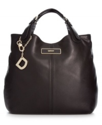 Carry off this season's essential style effortlessly with this elegant and understated tote from DKNY. Featuring sumptuous leather, golden hardware and exquisite stitch detailing, it's the perfect addition to any work or weekend wardrobe. Carry off this season's essential style effortlessly with this elegant and understated tote from DKNY. Featuring sumptuous leather, golden hardware and exquisite stitch detailing, it's the perfect addition to any work or weekend wardrobe.
