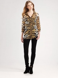 Semi-sheer silk top supercharged by a wildly chic tiger print. Point collarButton frontLong sleeves with buttoned cuffsShirttail hem hits below the hipsSilkDry cleanImportedModel shown is 5'10 (177cm) wearing US size Small.This style runs true to size. We recommend ordering your usual size for a standard fit. Semi-sheer silk top supercharged by a wildly chic tiger print. Point collarButton frontLong sleeves with buttoned cuffsShirttail hem hits below the hipsSilkDry cleanImportedModel shown is 5'10 (177cm) wearing US size Small.This style runs true to size. We recommend ordering your usual size for a standard fit.