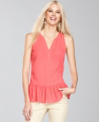 Try out the silhouette of the season -- the peplum -- with INC's petite top. A charming addition to any wardrobe. Try out the silhouette of the season -- the peplum -- with INC's petite top. A charming addition to any wardrobe.