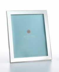 Showcase friends and family members in this modern wide-rimmed frame from the Martha Stewart Collection. Clean lines and a silver-plated finish offer chic sophistication for any home. Showcase friends and family members in this modern wide-rimmed frame from the Martha Stewart Collection. Clean lines and a silver-plated finish offer chic sophistication for any home.