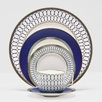 Embellished with intricate garlands, oval links and a fanciful dragon motif, this Wedgwood dinnerware evokes Europe's glorious Renaissance period. Rendered in deep blue and gold to transform any formal meal into a spectacular royal gala. Embellished with intricate garlands, oval links and a fanciful dragon motif, this Wedgwood dinnerware evokes Europe's glorious Renaissance period. Rendered in deep blue and gold to transform any formal meal into a spectacular royal gala.