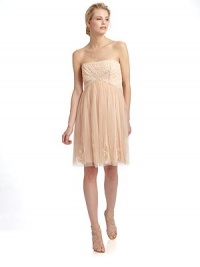 An ultra feminine look for evening, this strapless Empire cut is detailed with soft hued beads and sequins.Strapless neckline Embellished mesh bodice Interior bra cups with boning Pleated mesh skirt with embellishment Back zipper Fully lined About 38 from shoulder to hem Nylon Spot clean only Imported An ultra feminine look for evening, this strapless Empire cut is detailed with soft hued beads and sequins.Strapless neckline Embellished mesh bodice Interior bra cups with boning Pleated mesh skirt with embellishment Back zipper Fully lined About 38 from shoulder to hem Nylon Spot clean only Imported