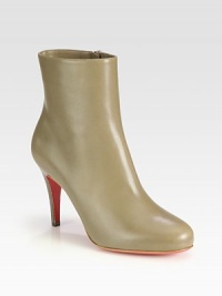 Butter-soft calfskin forms this elevated silhouette, expertly crafted in Italy for superior fit. Stacked heel, 3½ (90mm)Leather upperSide zipLeather liningSignature red leather solePadded insoleMade in Italy Butter-soft calfskin forms this elevated silhouette, expertly crafted in Italy for superior fit. Stacked heel, 3½ (90mm)Leather upperSide zipLeather liningSignature red leather solePadded insoleMade in Italy