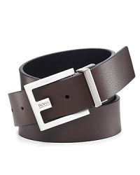 Pebble leather casual belt with square end. Flat metal buckle with logo at notch. Pebble leather casual belt with square end. Flat metal buckle with logo at notch.