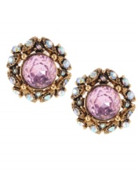 Lovely and ladylike. Pretty faceted pink crystals stand out on these sweet stud earrings from Betsey Johnson. Adorned with glittering clear crystal accents, they're crafted in antique gold tone mixed metal. Approximate diameter: 5/8 inch. Lovely and ladylike. Pretty faceted pink crystals stand out on these sweet stud earrings from Betsey Johnson. Adorned with glittering clear crystal accents, they're crafted in antique gold tone mixed metal. Approximate diameter: 5/8 inch.