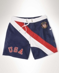 Rendered in a quick-drying blend of cotton and nylon, a classic-fitting swim trunk draws inspiration from vintage competition gear. Rendered in a quick-drying blend of cotton and nylon, a classic-fitting swim trunk draws inspiration from vintage competition gear.
