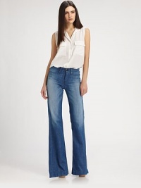 Vintage-wash denim cut in a sophisticated wide-leg that lengthens the silhouette.THE FITFitted through hips and thighsRise, about 9½Inseam, about 35THE DETAILSZip flyFront slash pocketsSignature stitch back pockets99% cotton/1% spandexMachine washMade in USAModel shown is 5'9 (175cm) wearing US size 4. Vintage-wash denim cut in a sophisticated wide-leg that lengthens the silhouette.THE FITFitted through hips and thighsRise, about 9½Inseam, about 35THE DETAILSZip flyFront slash pocketsSignature stitch back pockets99% cotton/1% spandexMachine washMade in USAModel shown is 5'9 (175cm) wearing US size 4.