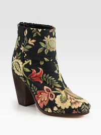 An on-trend floral-print canvas silhouette with a wooden heel and back zipper for easy access. Wooden heel, 3¾ (95mm)Canvas upperBack zipperLeather lining and solePadded insoleImported