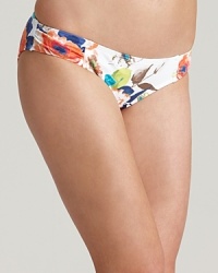 Tommy Bahama's Beach Blossoms bikini exudes classic glamour in a graphic floral print and crisp, fresh hues. Tommy Bahama's Beach Blossoms bikini exudes classic glamour in a graphic floral print and crisp, fresh hues.