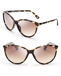 The silhouette may be retro inspired, but the gold detailing on these cateye sunnies from MICHAEL Michael Kors gives them a a fresh feel. The silhouette may be retro inspired, but the gold detailing on these cateye sunnies from MICHAEL Michael Kors gives them a a fresh feel.