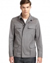 THE LOOKFold-over collarEpaulettesZip front with button closuresFlap snap pocketsSide slash pocketsVented hemlineTHE MATERIALCottonCARE & ORIGINDry cleanImported