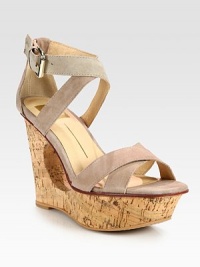 Stacked cutout wedge adds an architectural aesthetic to suede criss-cross straps with an adjustable ankle strap. Stacked cutout wedge, 4 (100mm)Stacked platform, 1 (25mm)Compares to a 3 heel (75mm)Suede upperLeather lining and solePadded insoleImported Stacked cutout wedge adds an architectural aesthetic to suede criss-cross straps with an adjustable ankle strap. Stacked cutout wedge, 4 (100mm)Stacked platform, 1 (25mm)Compares to a 3 heel (75mm)Suede upperLeather lining and solePadded insoleImported