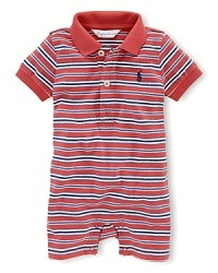 A short-sleeved shortall with bright variegated stripes is rendered in breathable cotton jersey. A short-sleeved shortall with bright variegated stripes is rendered in breathable cotton jersey.