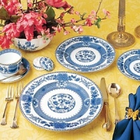 Edged in gold, this distinguished dinner service is based on a Chinese export porcelain pattern circa 1730 featuring a flowered medallion and floral sprays. Edged in gold, this distinguished dinner service is based on a Chinese export porcelain pattern circa 1730 featuring a flowered medallion and floral sprays.